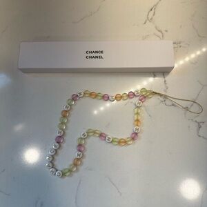 Multicolor Beaded gift with purchase Chanel chance phone charm.